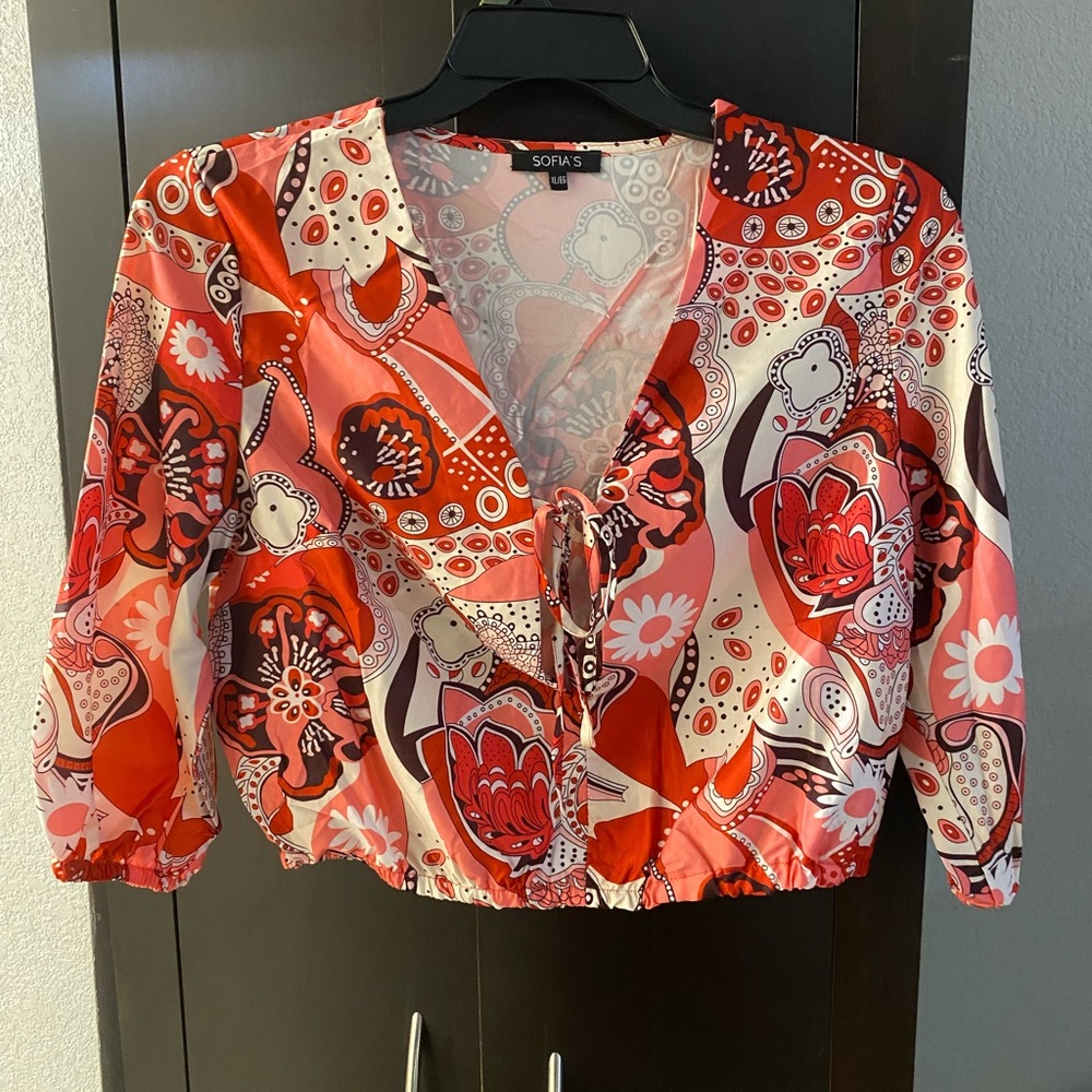 Vibrant Red and White Patterned Blouse